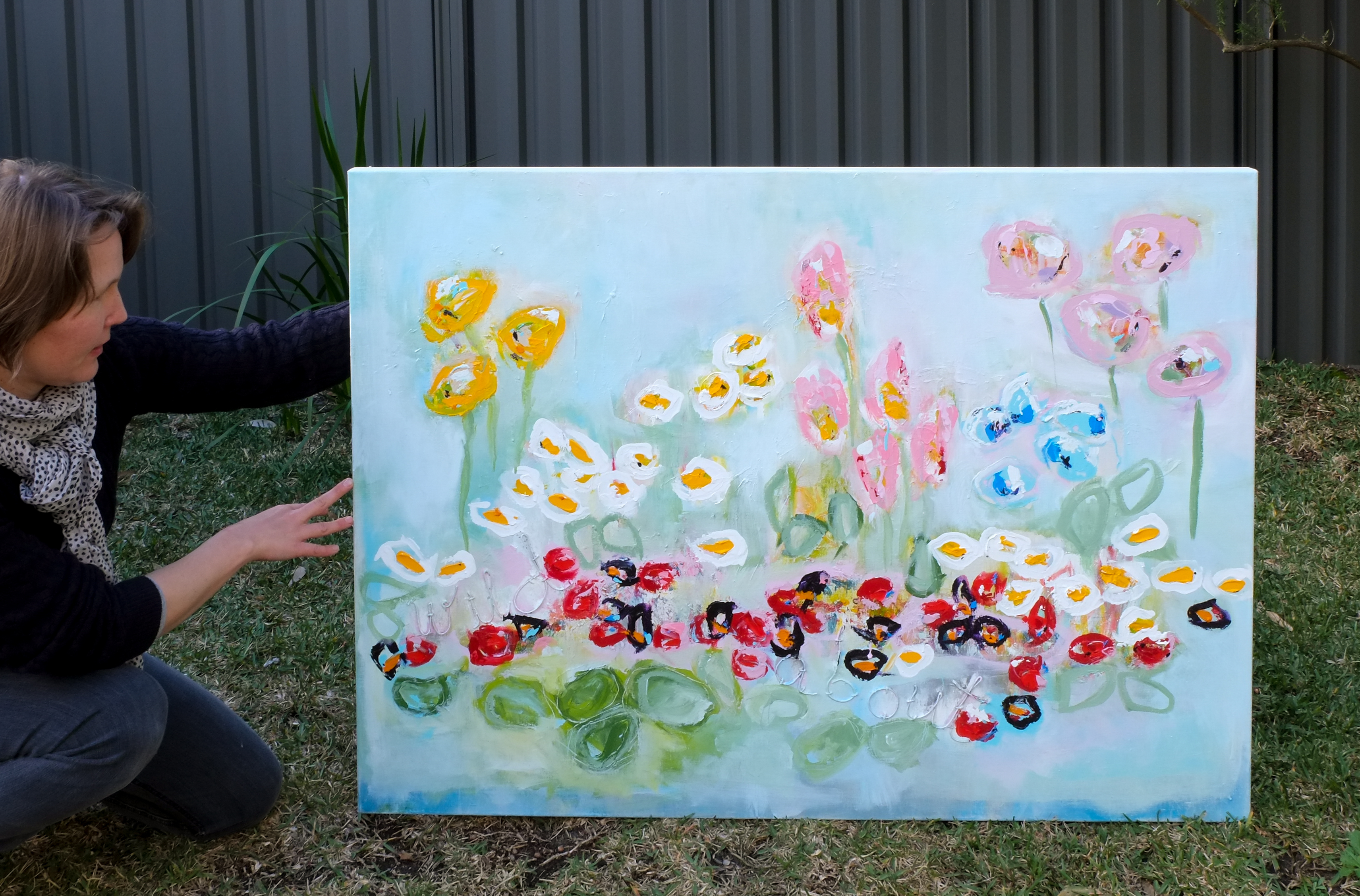 Artist Hela Donela and her painting Wild About Flowers